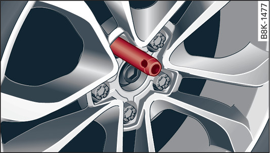 Fig. 318 Wheel: Mounting pin in wheel bolt hole nearest to the top