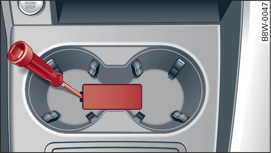 Fig. 107 Porte-gobelets avant : retrait du cache