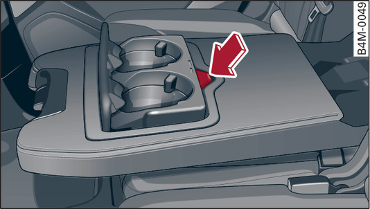 Fig. 68 Rear centre armrest: Cup holders* (example)