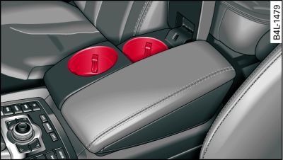 Centre armrest (comfort version*): Front cup holder