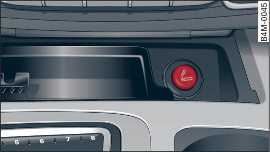 Fig. 77 Console centrale avant : allume-cigare 