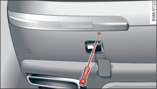 Fig. 365 Rear lights in left bumper: Loosening screw