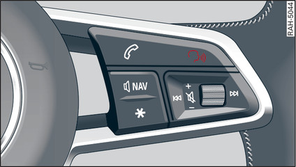 Fig. 131Tecla de falar e seletor direito no volante multifunções